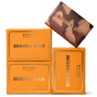 Four Wonder Valley Hinoki Bar Soaps are stacked: three in orange boxes with gold lettering and laurel motifs, one in marbled brown packaging with gold text—each bringing a touch of onsen-inspired luxury.