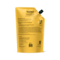 A yellow refill pouch of Wonder Valley Refill Hinoki Body Wash with a black spout, ideal for refilling your bottle. The back shows product details, ingredients, usage instructions, and a QR code.
