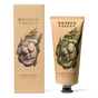 A beige tube and matching box of Wonder Valley Seaweed Body Scrub, adorned with a gold product name and an artistic torso entwined with seaweed, contains mineral clays and exfoliating sea salt for a refreshing cleanse.
