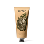 Wonder Valley Seaweed Body Scrub: a 120 ml tan tube with black cap and an illustrated seaweed-entwined torso, infused with exfoliating sea salt.
