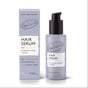 A bottle of UpCircle Hair Serum with Rice Water + Baobab stands beside its lavender box, which showcases product details and branding for frizz control.