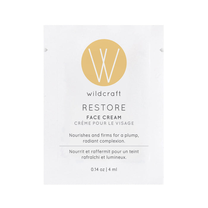A 4 ml sample packet of Wildcraft Restore Face Cream with a beige circle logo. Enriched with rosehip oils, it nourishes and firms dry skin for a plump, radiant look.