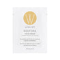 A 4 ml sample packet of Wildcraft Restore Face Cream with a beige circle logo. Enriched with rosehip oils, it nourishes and firms dry skin for a plump, radiant look.