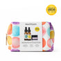 A colorful, polka dot Mad Hippie pouch holds the Wintertime Essentials set with Vitamin C Serum, Corrective Peptides Serum (dropper bottle), and Triple C Night Cream. A yellow circle highlights the $60.00 value and $24.99 SRP.