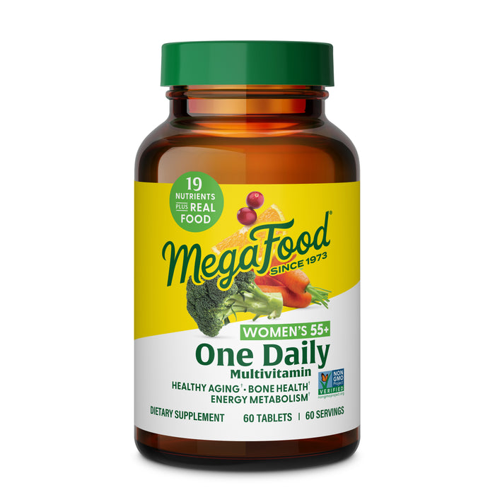 A 60-tablet bottle of MegaFood Women's 55+ One Daily multivitamin features a yellow label with vegetables and promotes 19 nutrients for daily vitamins, bone health, healthy aging, and energy metabolism.
