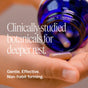 A person pours capsules from a blue bottle labeled “You're a Knockout Sleep & Stress Support Capsules by Ora Organic” into their hand. Text reads: “Clinically-studied botanicals and plant-based melatonin for restful, non-habit forming sleep.”.