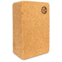 The Yoloha Yoga Cork Yoga Block stands upright with rounded corners, providing excellent support for your practice. A small black flower-like logo is stamped near one top edge, and this antimicrobial block helps ensure a clean and safe yoga experience.