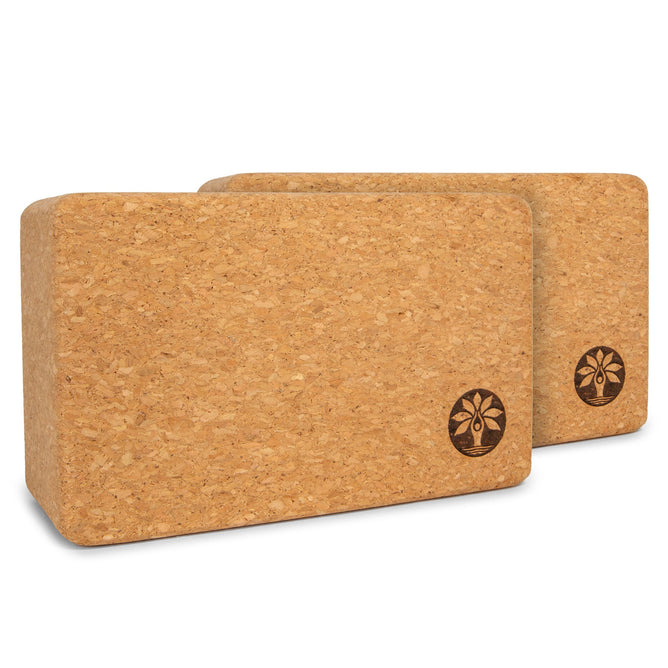 Two rectangular Yoloha Yoga Cork Yoga Blocks with rounded edges are placed side by side, creating a practical Cork Yoga Block Set. Each block features a small tree emblem printed on one corner, and the natural cork texture is clearly visible on the surface.