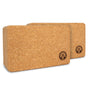 Two rectangular Yoloha Yoga Cork Yoga Blocks with rounded edges are placed side by side, creating a practical Cork Yoga Block Set. Each block features a small tree emblem printed on one corner, and the natural cork texture is clearly visible on the surface.