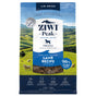 A blue and green bag of ZIWI Air-Dried Dog Food - Lamb, an all-natural, high-protein, grain-free recipe with superfoods. The packaging shows sheep grazing on green hills and promotes air-drying for a raw-alternative dog food.