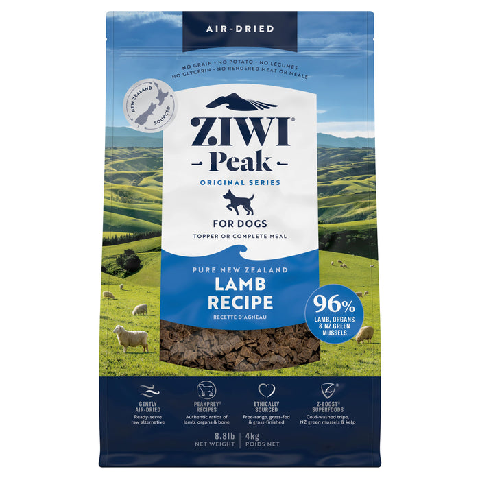 A bag of ZIWI Air-Dried Dog Food - Lamb features green New Zealand hills and sheep on the packaging. This grain-free, high-protein food includes 96% lamb, organs, and mussels for all-natural canine nutrition with superfoods.