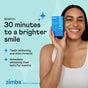 A smiling woman holds a box of Zimba Whitening Strips. Text highlights benefits: only 30 minutes for a brighter smile, effective whitening and stain removal, plus immediate results from Zimba teeth whitening strips that last for months.