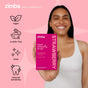 A smiling woman holds a pink box of Zimba Whitening Strips. Icons and text highlight: vegan, cruelty-free, clean, reduced sensitivity, whiter teeth. The pink background displays the Zimba logo and slogan.