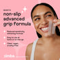 A smiling woman holds Zimba Whitening Strips near her teeth. Text highlights: non-slip advanced grip, reduced sensitivity, easy at-home or on-the-go use, clean, vegan, cruelty-free. Zimba logo appears at the bottom.