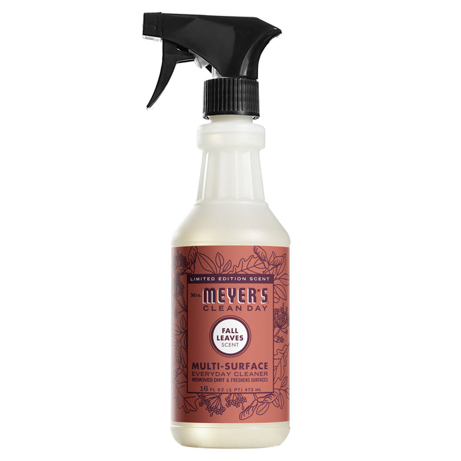 Mrs. Meyers Multi-Surface Cleaner in the limited edition Fall Leaves scent features a cruelty-free formula. The 16 FL OZ (473 mL) bottle has a black spray nozzle and showcases leaf illustrations on its label.