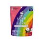 A colorful bag of Shameless Pets Love is Love soft baked dog treats, blueberry, strawberry & yogurt flavor. The packaging features rainbow stripes and a cartoon dog, and states it is free from grain, corn, and soy. Net weight 6 oz.