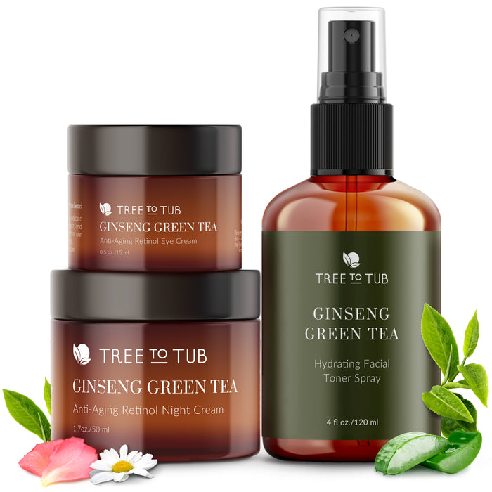 Tree to Tubs Anti Aging Hyaluronic Acid Face Care Starter Set features a Ginseng Green Tea Retinol Eye Cream, Retinol Night Cream, and Hydrating Toner Spray with Hyaluronic Acid. Surrounded by leaves and a flower, the display offers a natural and clean aesthetic.