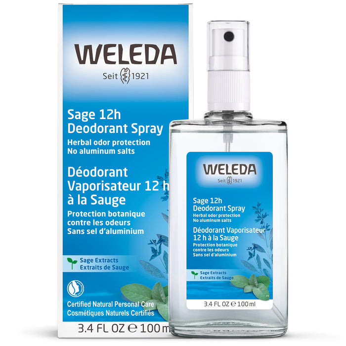 A clear glass spray bottle labeled WELEDA Sage 12h Deodorant Spray stands in front of its blue and white box packaging, featuring sage leaf illustrations and product information in English and French.