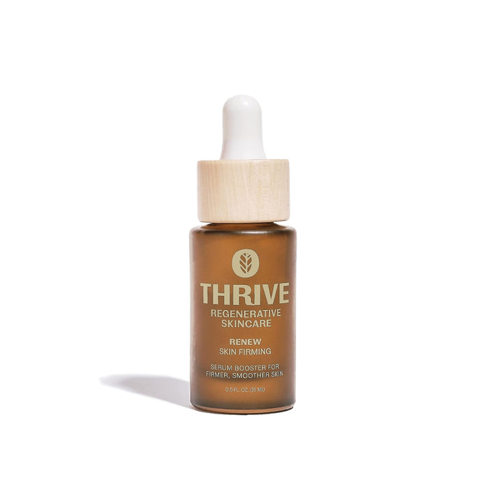 A brown glass dropper bottle labeled THRIVE REGENERATIVE SKINCARE RENEW SKIN FIRMING with a wooden cap, standing upright on a white background.