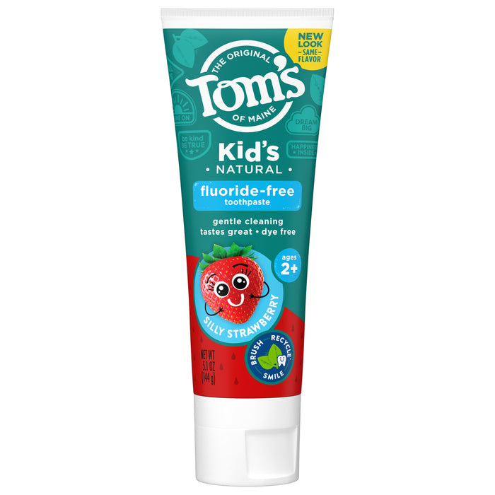 A tube of Tom’s of Maine Kid’s Natural fluoride-free toothpaste, Silly Strawberry flavor, for ages 2+, with a cartoon strawberry and a teal label highlighting gentle cleaning and dye-free formula.