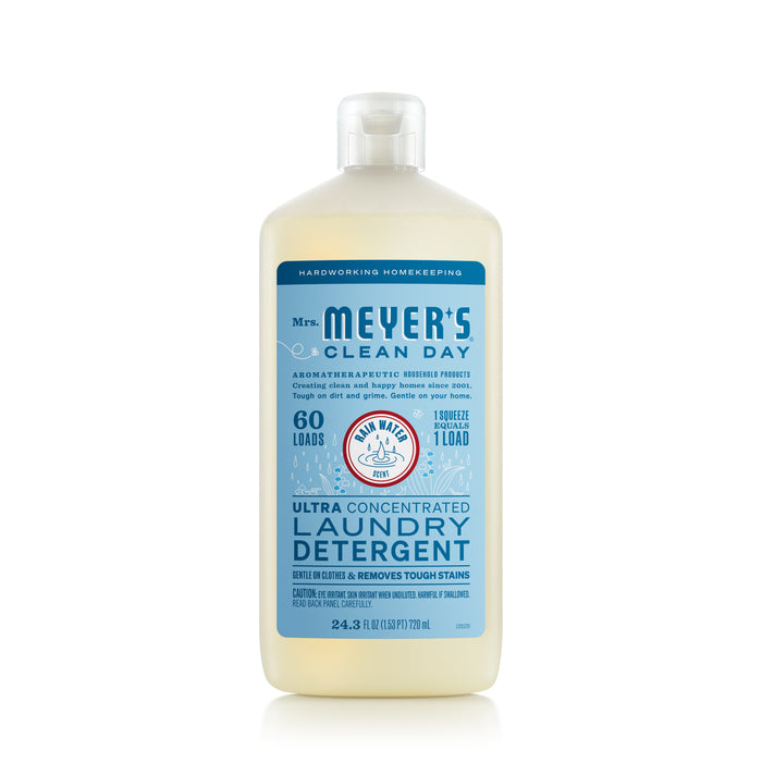 A bottle of Mrs. Meyer’s Clean Day Ultra Concentrated Laundry Detergent, 24 fl oz, with a light blue and white label featuring product details and usage instructions.