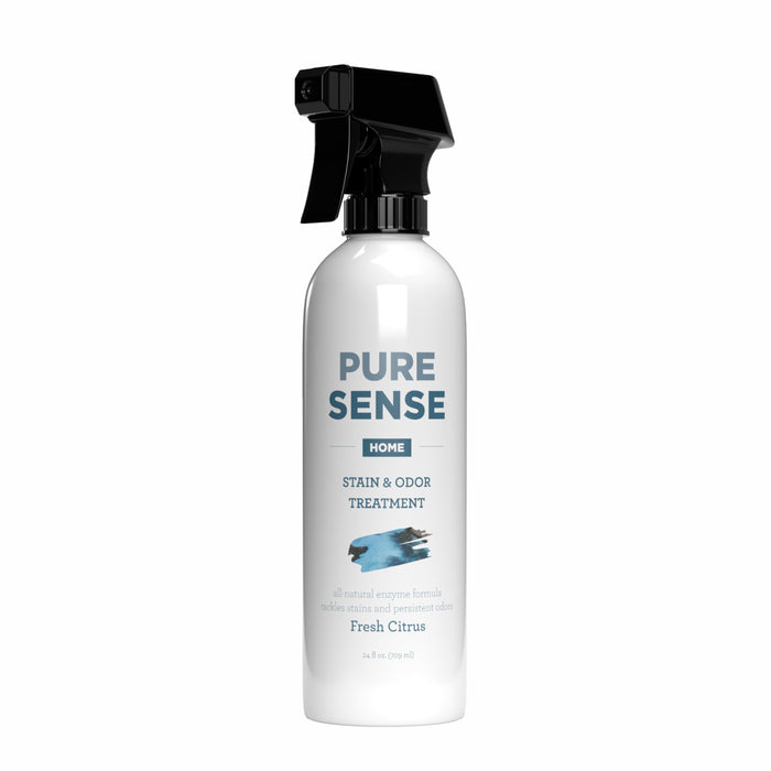 A white spray bottle labeled “PURE SENSE HOME Stain & Odor Treatment” with a black trigger nozzle. The label mentions an all-natural enzyme formula in a Fresh Citrus scent.