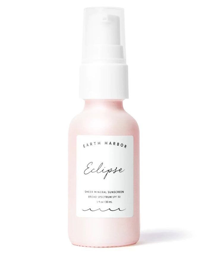 A pink and white pump bottle labeled Earth Harbor Eclipse Sheer Mineral Sunscreen Broad Spectrum SPF 30, 1 fl oz / 30 mL is shown against a plain white background.