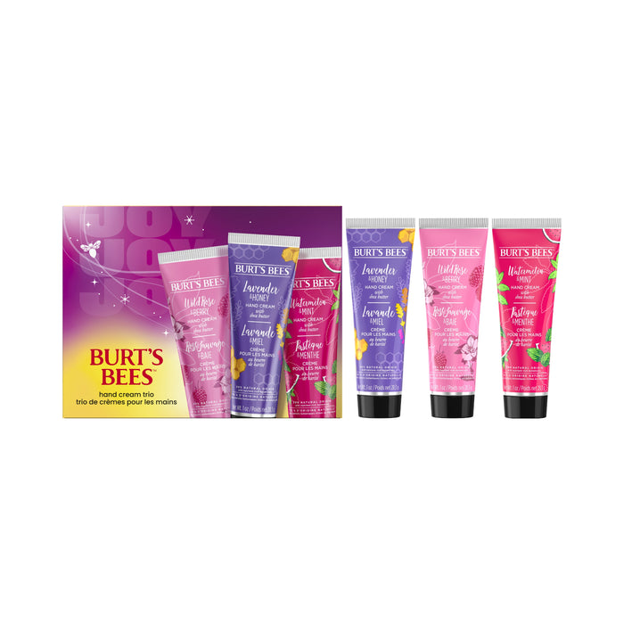 Burt’s Bees Hand Cream with Shea Butter Trio Gift Set includes three vibrant tubes—Wild Rose & Berry, Lavender & Honey, and Watermelon & Mint—beautifully displayed beside a purple gift box. This natural collection is ideal for treating yourself or delighting someone special.