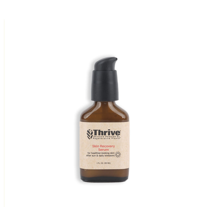 A brown glass bottle with a black pump labeled Thrive Skin Recovery Serum for healthy-looking skin, placed against a plain white background.