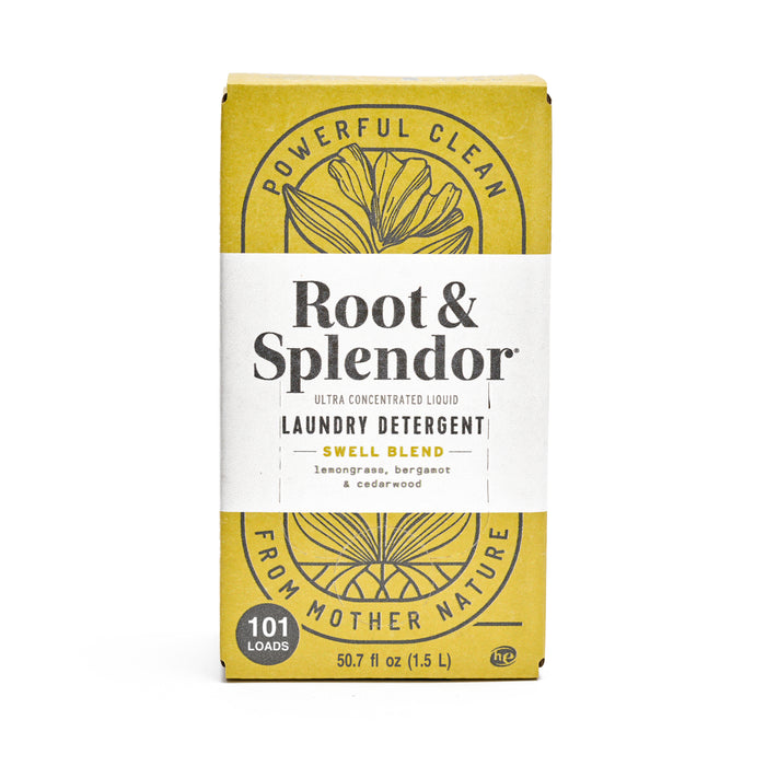 A box of Root & Splendor Ultra Concentrated Liquid Laundry Detergent, Swell Blend scent, featuring lemongrass, bergamot, and cedarwood. The package is yellow and white, labeled for 101 loads and 50.7 fl oz.