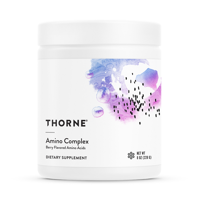 A white container of Thorne Amino Complex berry flavored dietary supplement with a colorful abstract purple and blue design on the label. The net weight is 8 oz (228.6 g).