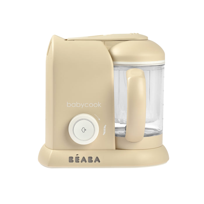 A beige BEABA Babycook baby food maker with a clear blending container, handle, and control dial, shown on a white background.