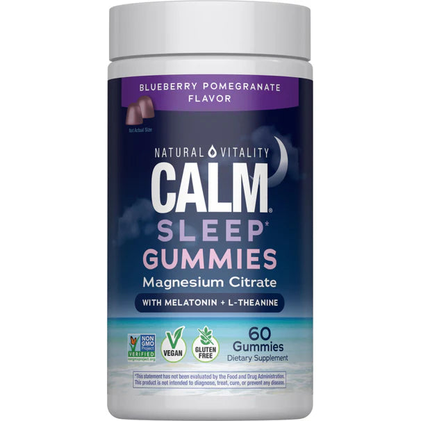 A bottle of Natural Vitality CALM Sleep with Melatonin Gummies in blueberry-pomegranate flavor, featuring magnesium citrate and L-theanine. Vegan, gluten-free, non-GMO; each bottle contains 60 gummies.