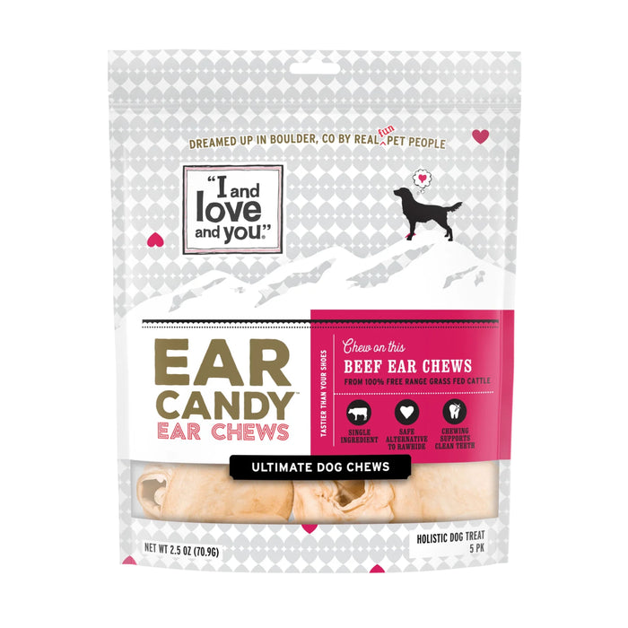 A white and gray bag of I and love and you brand Ear Candy Ear Chews, labeled as beef ear chews for dogs, with images of a dog silhouette and hearts on the packaging. Contents are visible at the bottom.