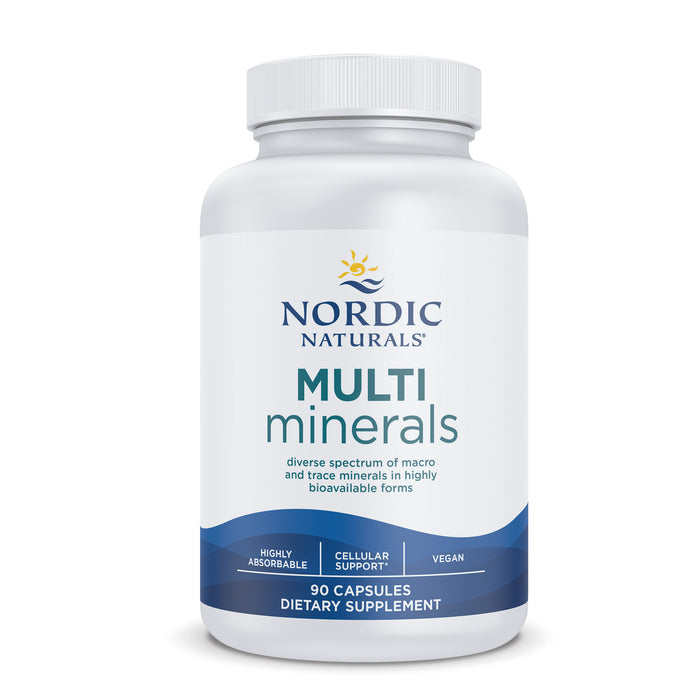 A white bottle of Nordic Naturals Multi Minerals dietary supplement, containing 90 capsules. The label highlights features such as highly absorbable, cellular support, and vegan.