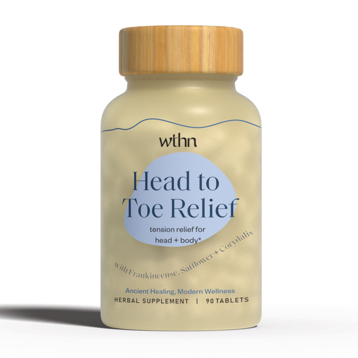 A beige bottle labeled “Head to Toe Relief” by WTHN, advertising tension relief for head and body. The label mentions frankincense, safflower, and crystals, and contains 90 herbal supplement tablets.