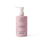 A pink pump bottle of Dabble & Dollop bath product with a cloud logo and directions for use printed on the back label. The bottle is standing upright against a white background.
