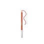 An orange-brown lip liner pencil with a silver cap is shown upright on a white background, with a wavy line drawn beside the pencil tip.