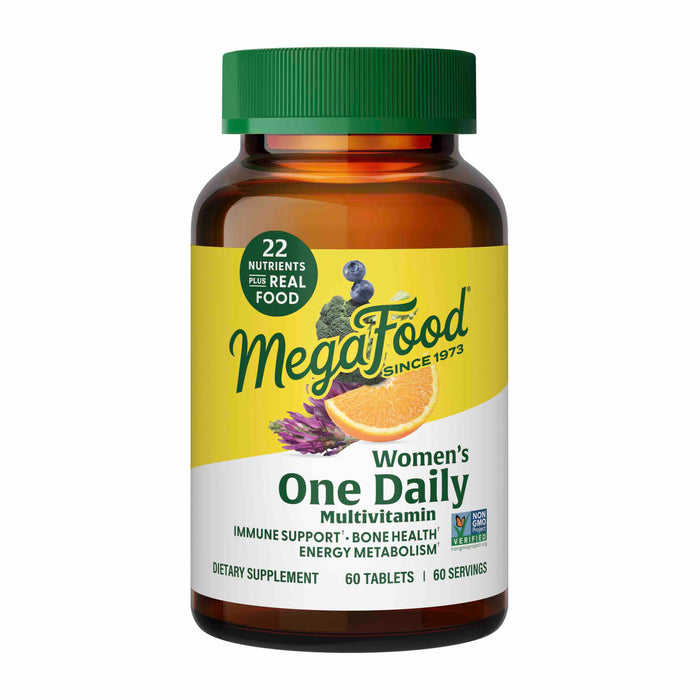 A bottle of MegaFood Women’s One Daily Multivitamin with green cap and yellow label, showing images of orange slices and herbs, and text highlighting immune support, bone health, and 22 nutrients from real food.