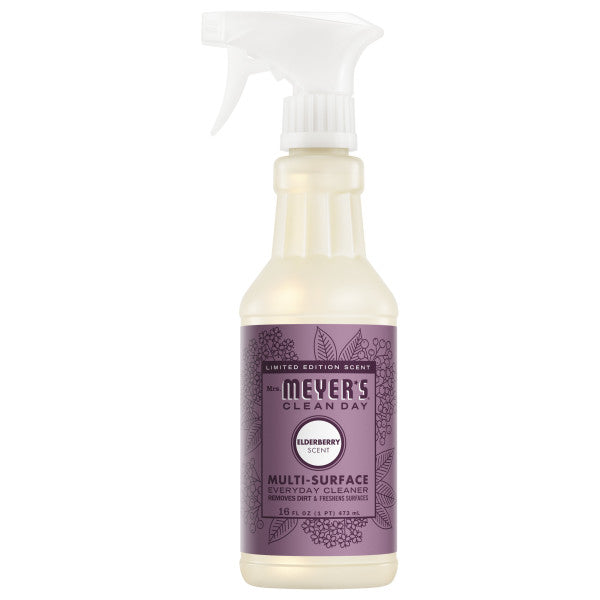 Mrs. Meyer's Multi-Surface Cleaner in limited edition Elderberry scent features a purple floral label and white spray nozzle—essential oils formula for every surface.