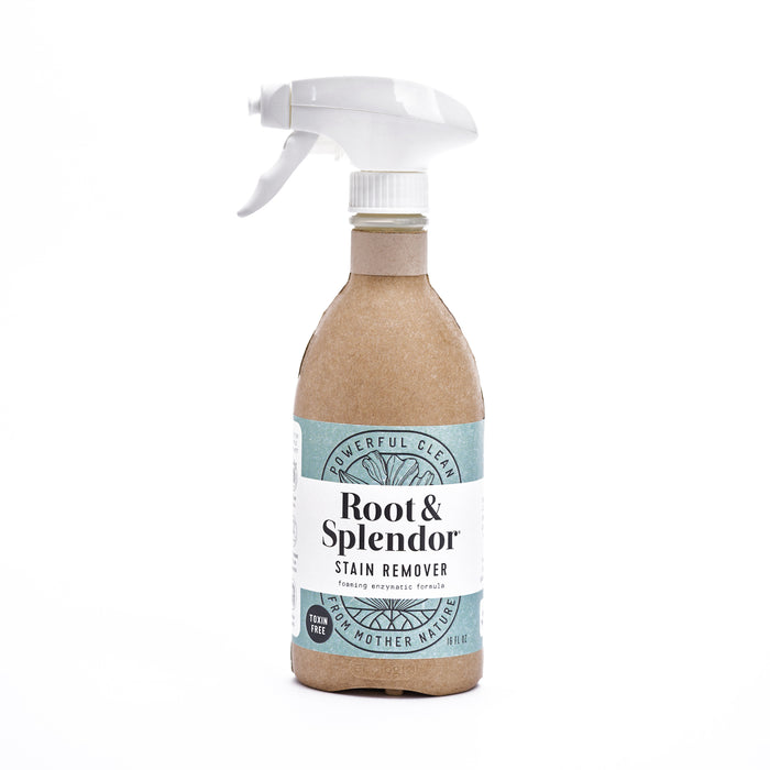 A spray bottle labeled Root & Splendor Stain Remover with eco-friendly brown packaging and a white trigger nozzle, standing upright on a white background.