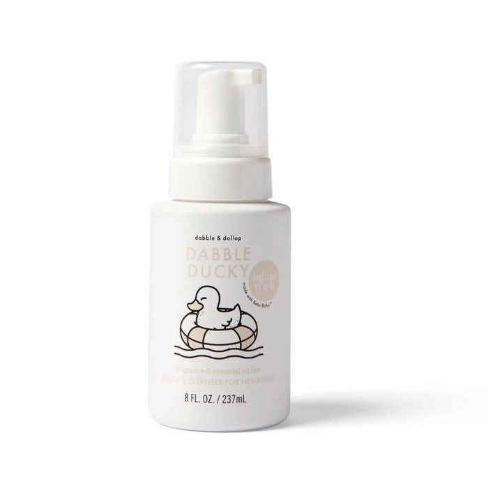 A white bottle of Dabble & Dollop Dabble Ducky foaming cleanser for newborns, featuring a pump dispenser and a label with a cartoon duck in a float. The bottle contains 8 fl. oz. (237 mL).