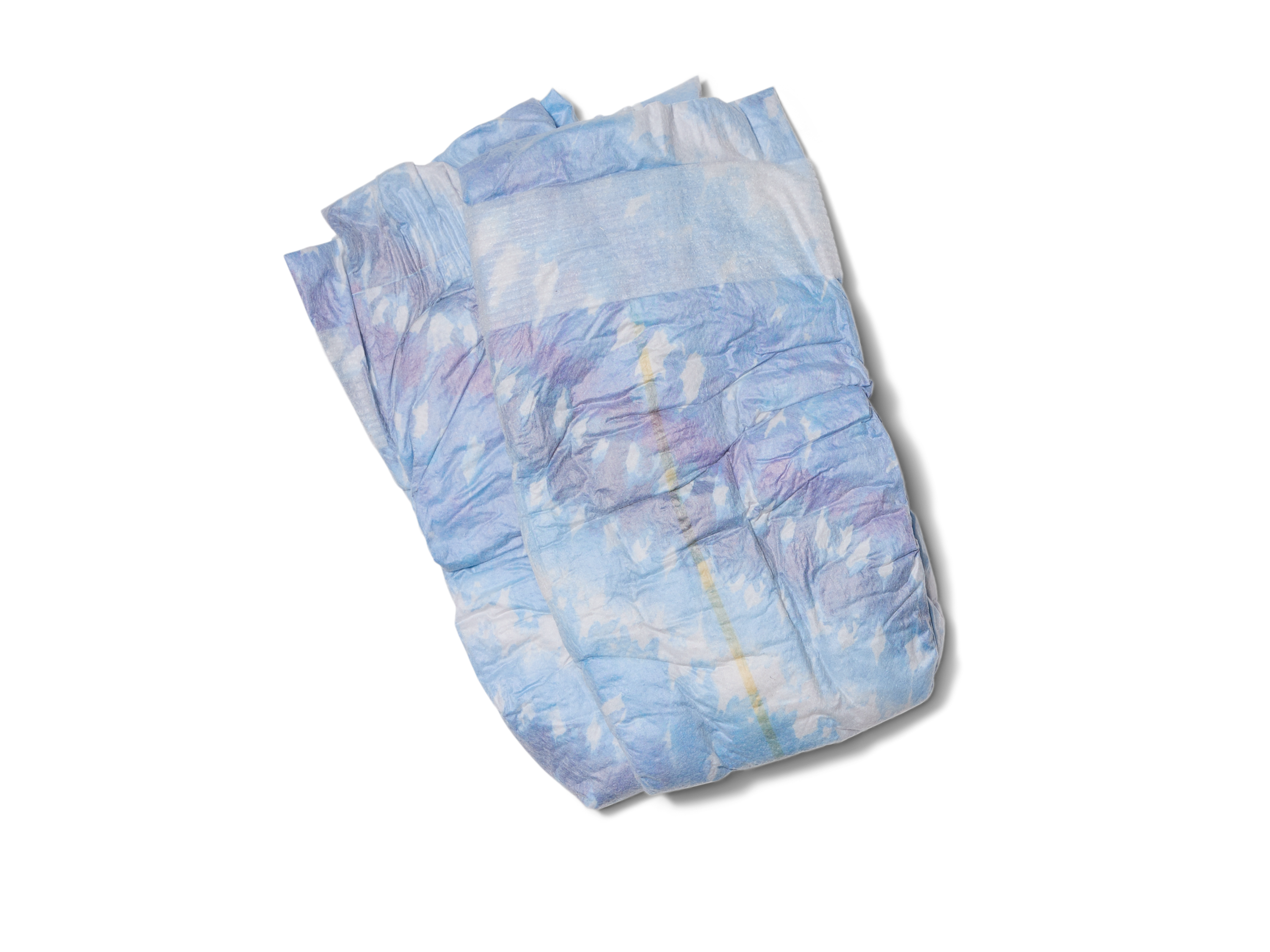 A single disposable baby diaper with a blue, purple, and yellow pattern is shown on a white background.