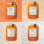 Four orange packets of VOESH Pumpkin Pie pedicure products are arranged in a grid on textured backgrounds, each labeled as Sea Salt Soak, Sugar Scrub, Mud Masque, and Massage Butter.