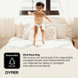 A toddler wearing a diaper smiles and jumps on a bed in a sunlit room. Text below highlights DYPER’s Simply Kind Diapers, made from responsibly sourced wood pulp with high safety standards, plus a tree icon labeled Responsibly Sourced.