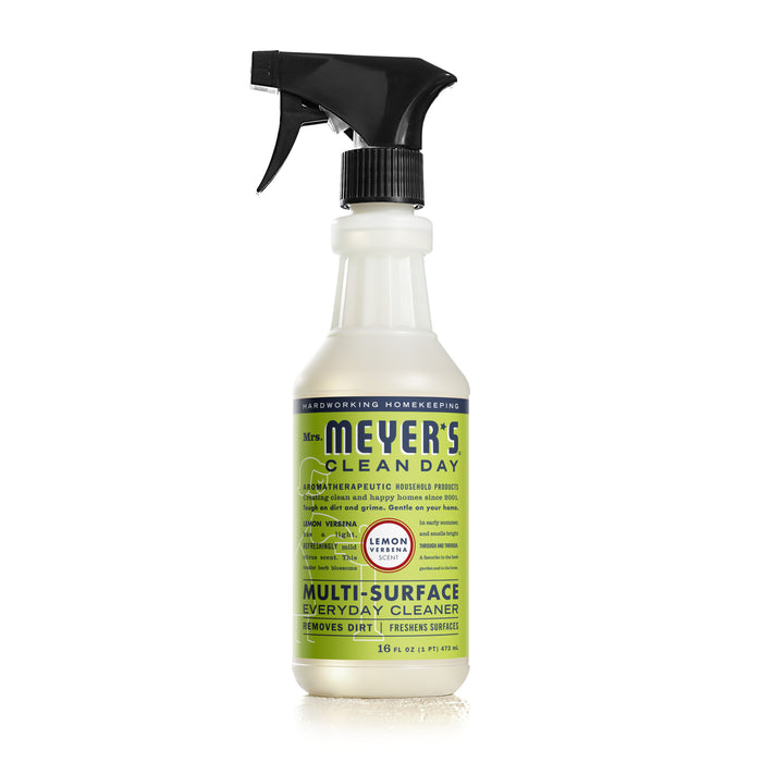 A spray bottle of Mrs. Meyer’s Clean Day Multi-Surface Everyday Cleaner in lemon scent, featuring a black spray nozzle and a yellow-green label with product details on a white background.