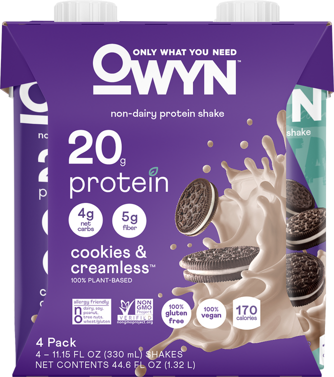 OWYN Protein Shake, 20G, features cookies & creamless flavor with 20g plant protein, 4g net carbs, and 5g fiber. Its gluten-free, contains superfood greens and vegan omega-3s. The packaging shows a shake splashing with cookie pieces and has only 170 calories per serving.