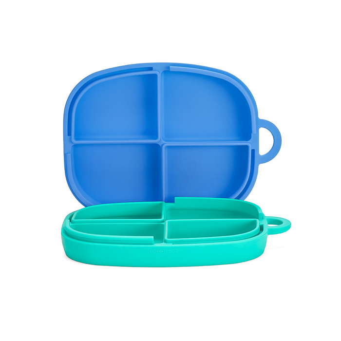 Two silicone divided plates, one blue and one teal, each with four compartments. The teal plate is in front, while the blue plate is propped up behind it, both with handles on one side.