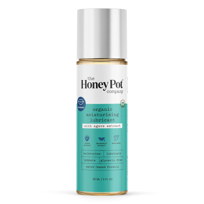 A bottle of The Honey Pot Company organic moisturizing lubricant with agave extract, featuring a gold cap and a teal-and-white label highlighting its natural, water-based, glycerin-free formula.