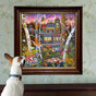 A dog with upright ears gazes at eeBoo Piece & Love’s "Alchemist's Forest 1000 Piece Puzzle," featuring Vasilisa Romanenko’s whimsical house in a vibrant forest, brimming with animals, birds, mushrooms, and lush vegetation.
